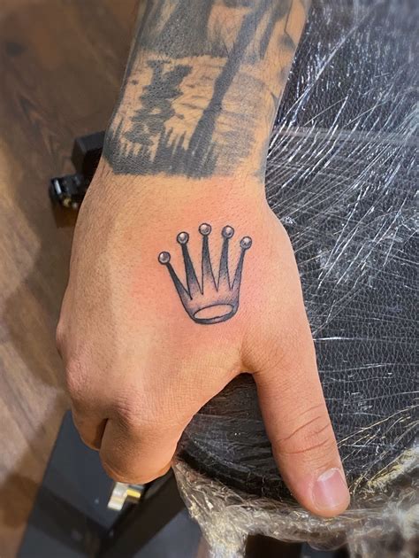 rolex crown ink tattoo.